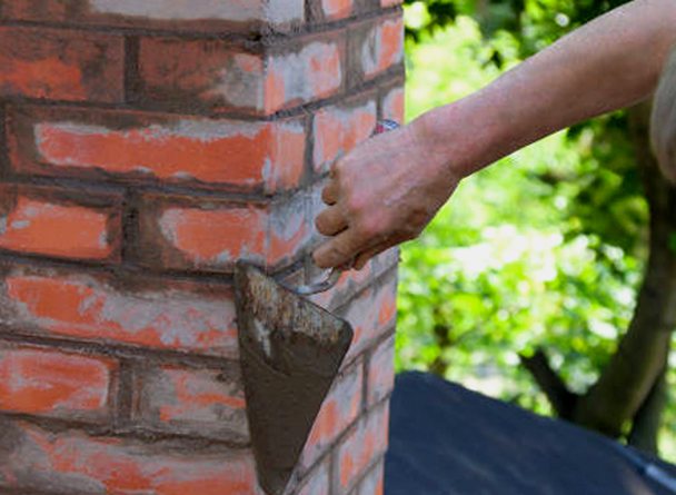 Fresh mortar made fast in chimney joints